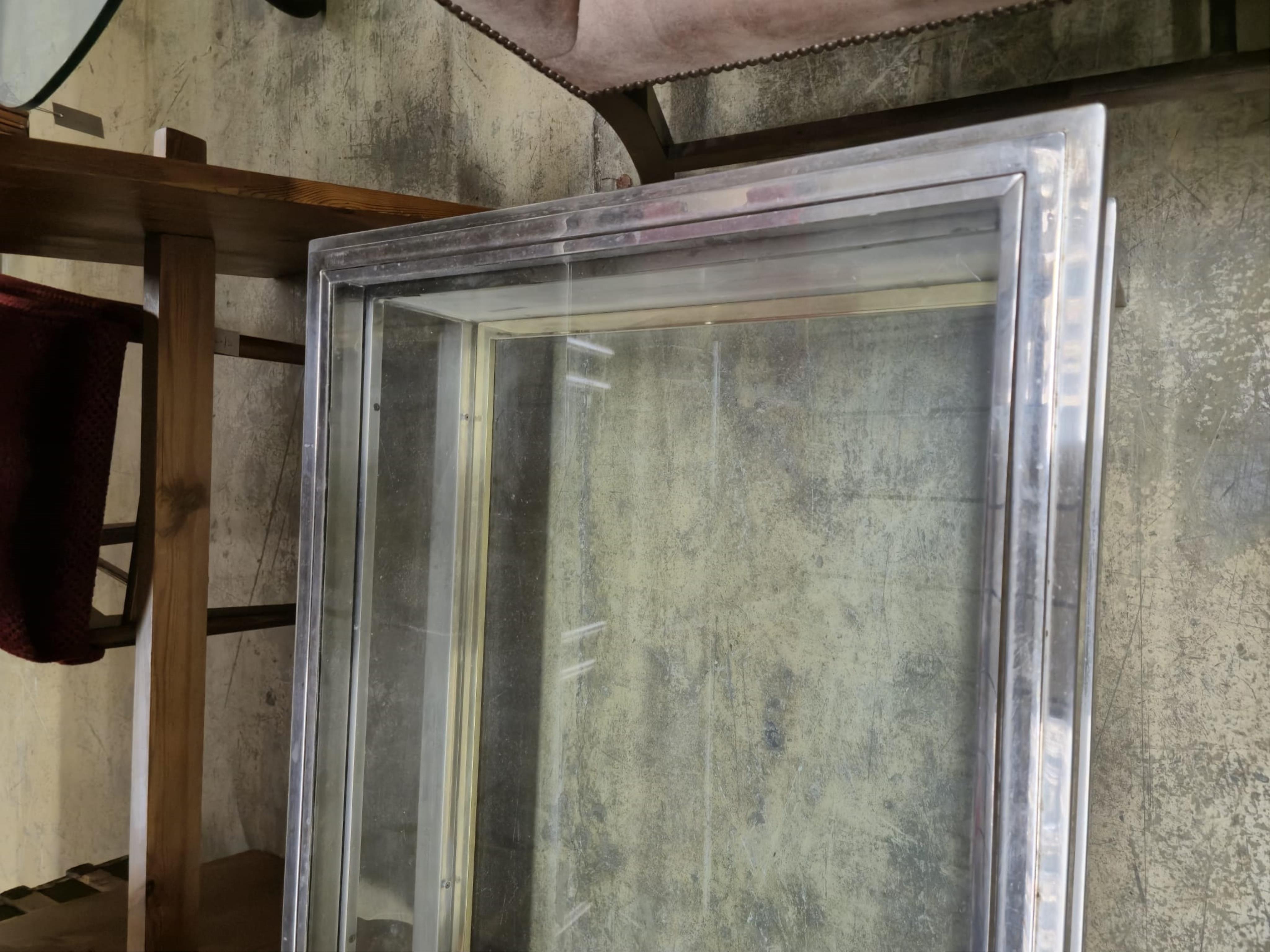 A Romeo Rega rectangular display coffee table, width 138cm, depth 68cm, height 42cm
